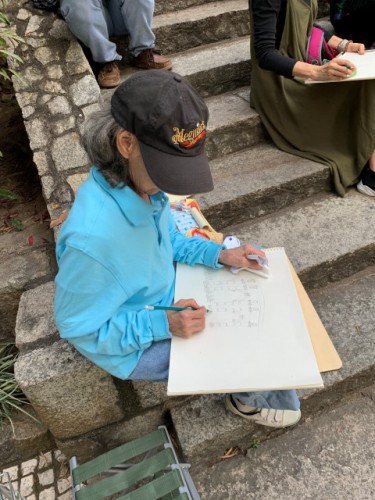 Os participantes a desenhar